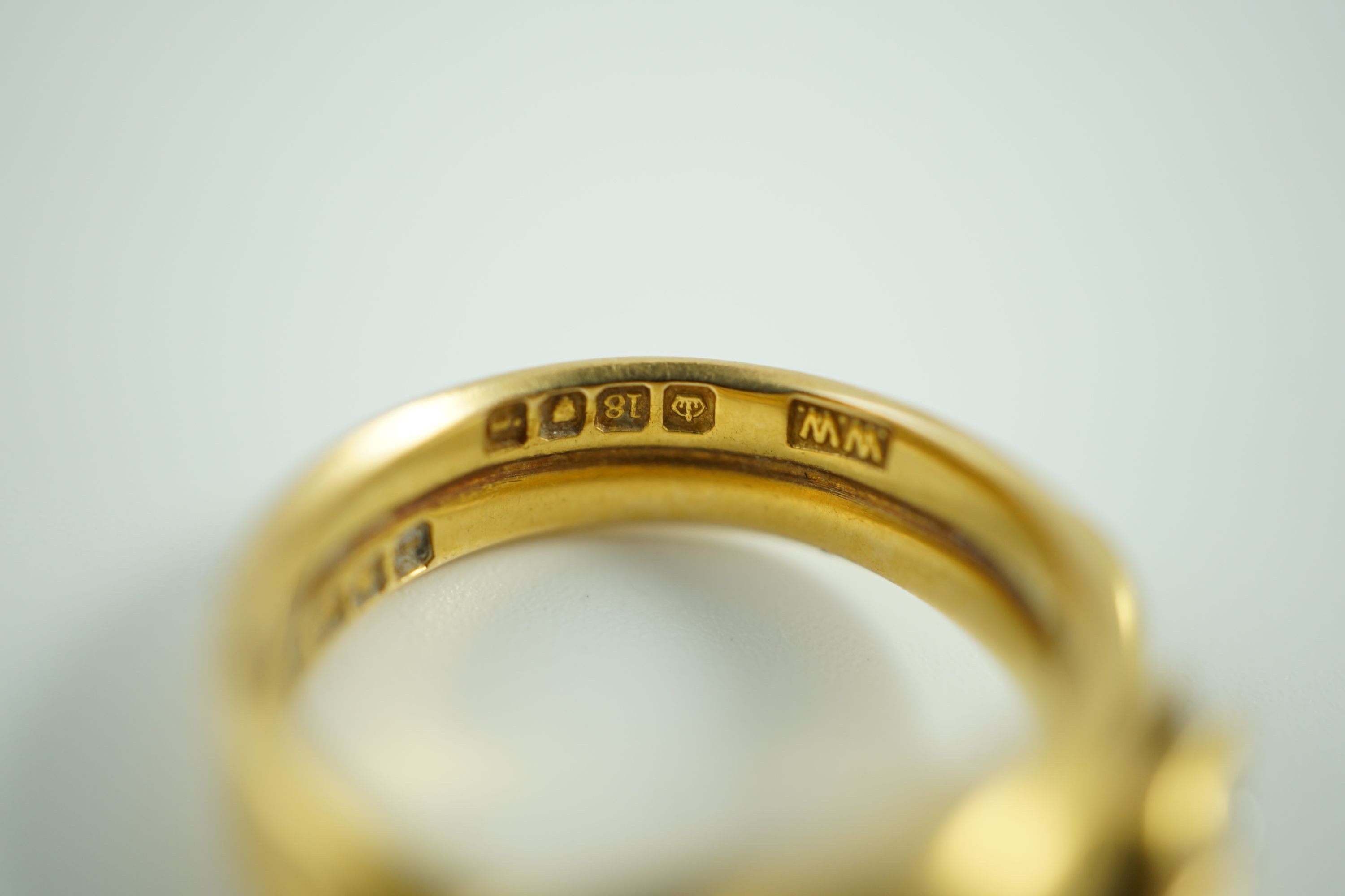 An Edwardian 18ct gold entwined twin serpent ring